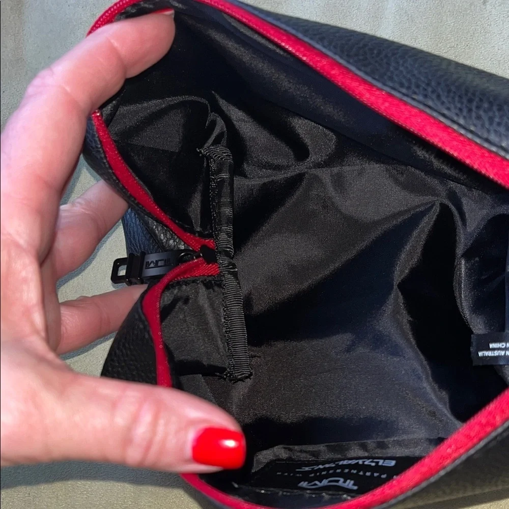 TUMI Textured Black Faux Leather toiletrie / travel bag